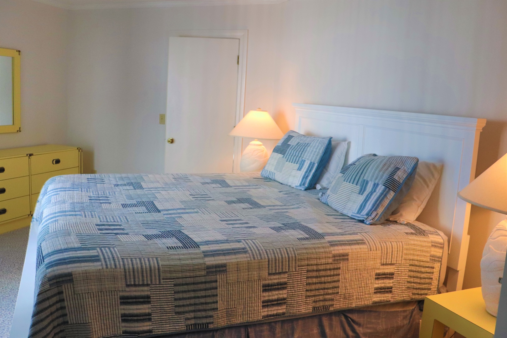 Sink into your comfortable bed with soft linens and gentle bedside lighting for a perfect night's rest.