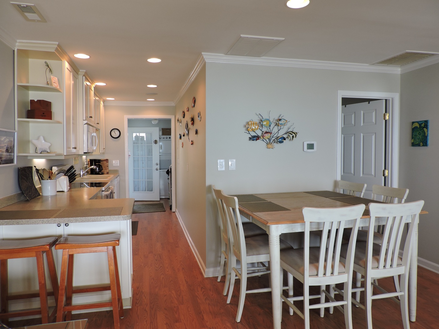 Your open kitchen flows seamlessly into the dining area, perfect for sharing meals and creating memories together.