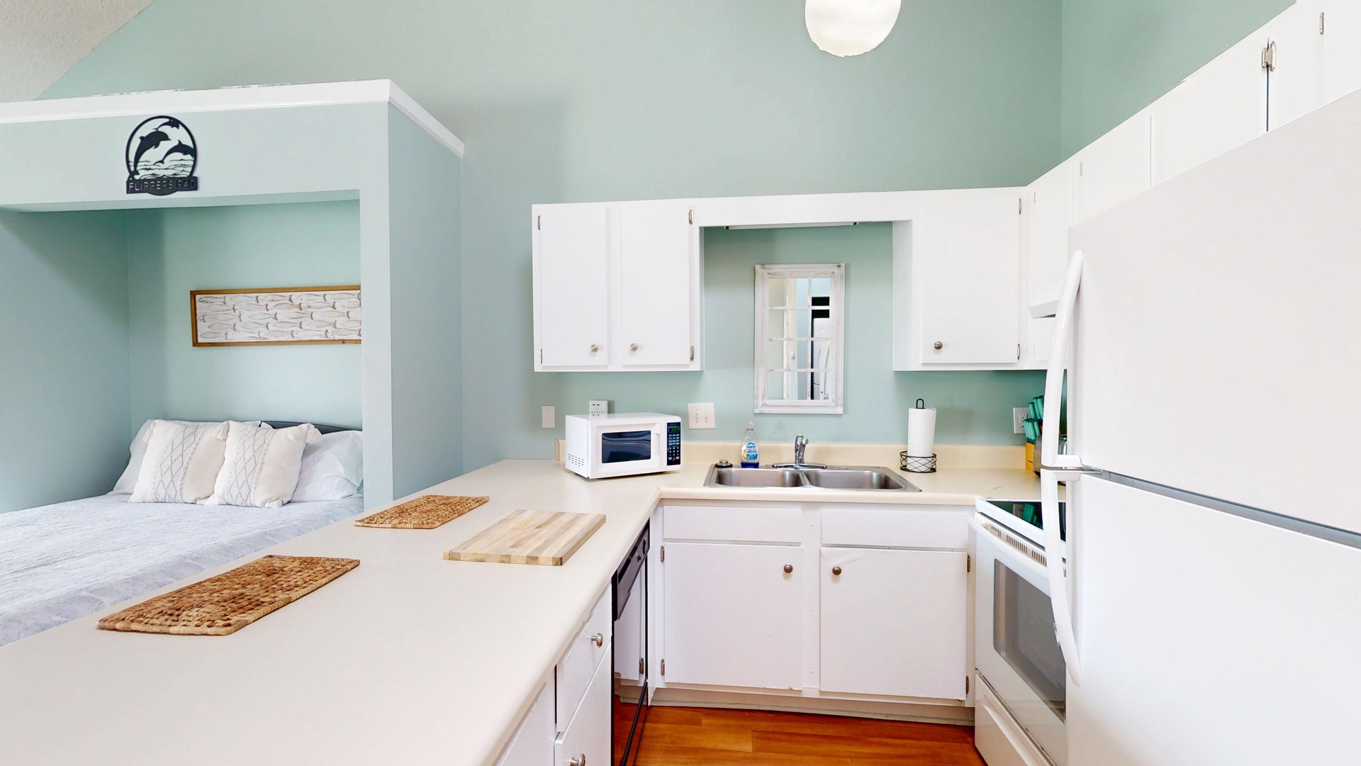 Your cozy studio combines comfort and convenience with a well-equipped kitchenette and peaceful sleeping nook, perfect for intimate getaways.