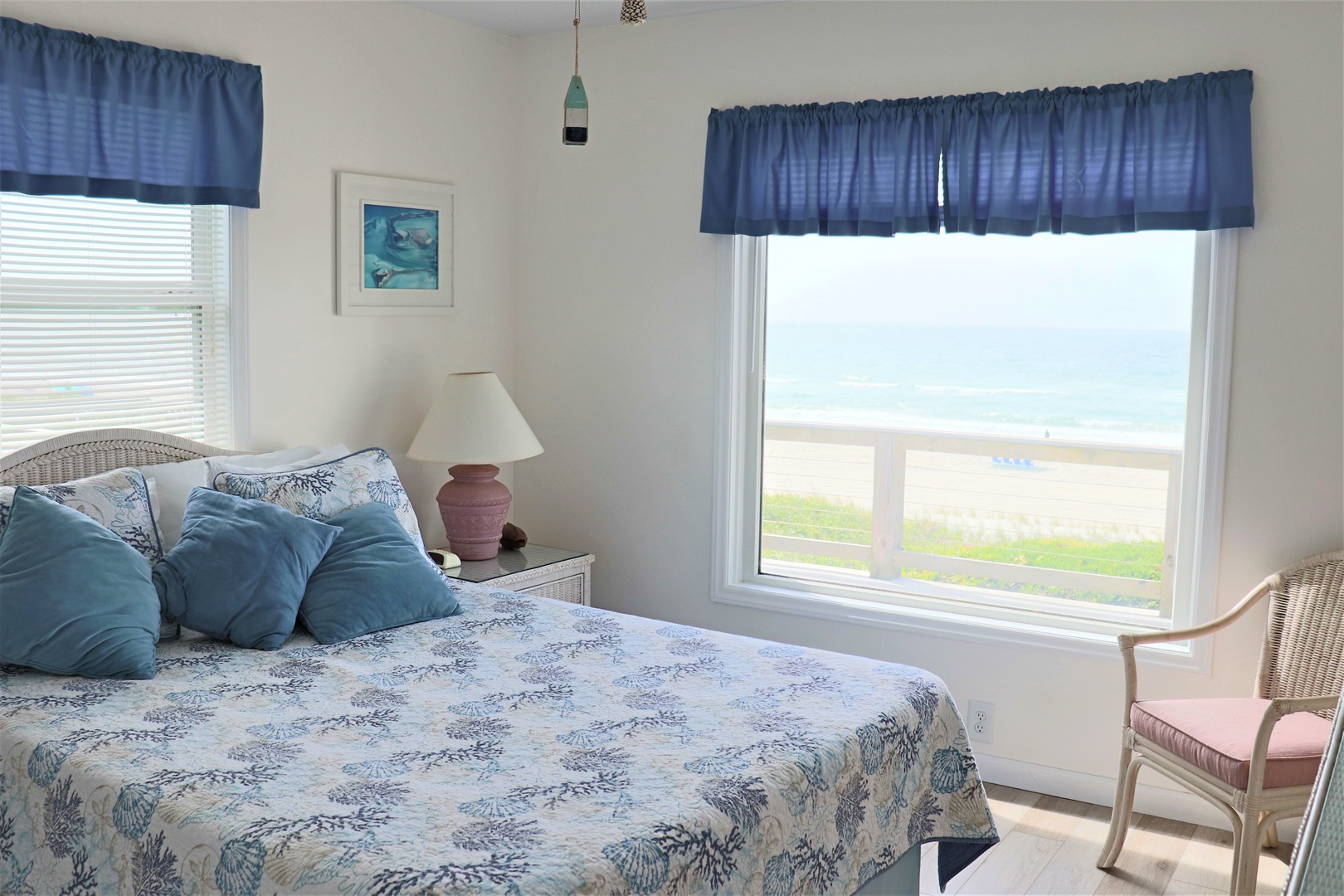 Wake up to stunning ocean views from your comfortable bed, where coastal decor and natural light create the perfect seaside sanctuary.