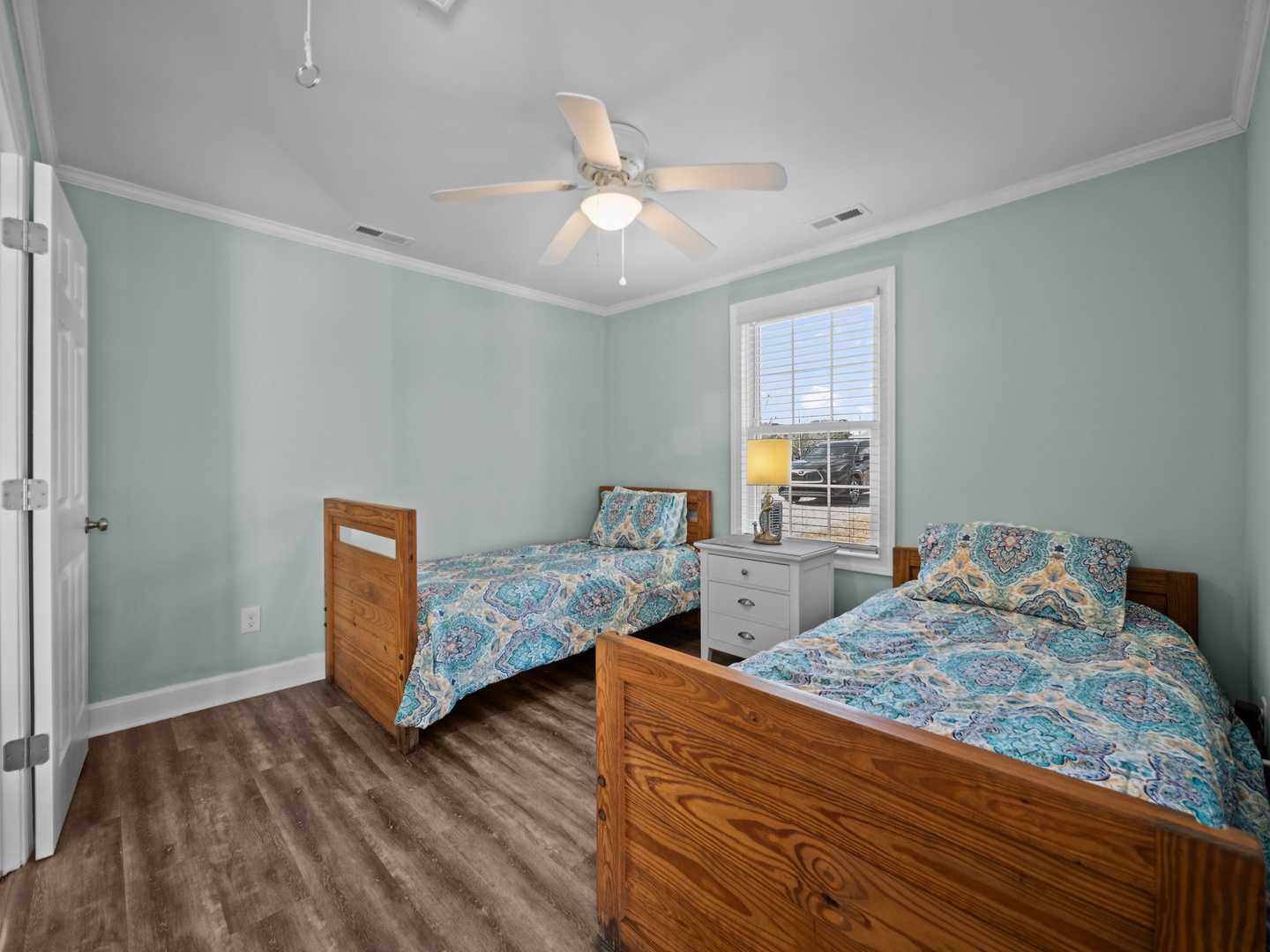 Rest peacefully in your twin bedroom with soothing mint walls and coastal bedding that brings seaside tranquility indoors.