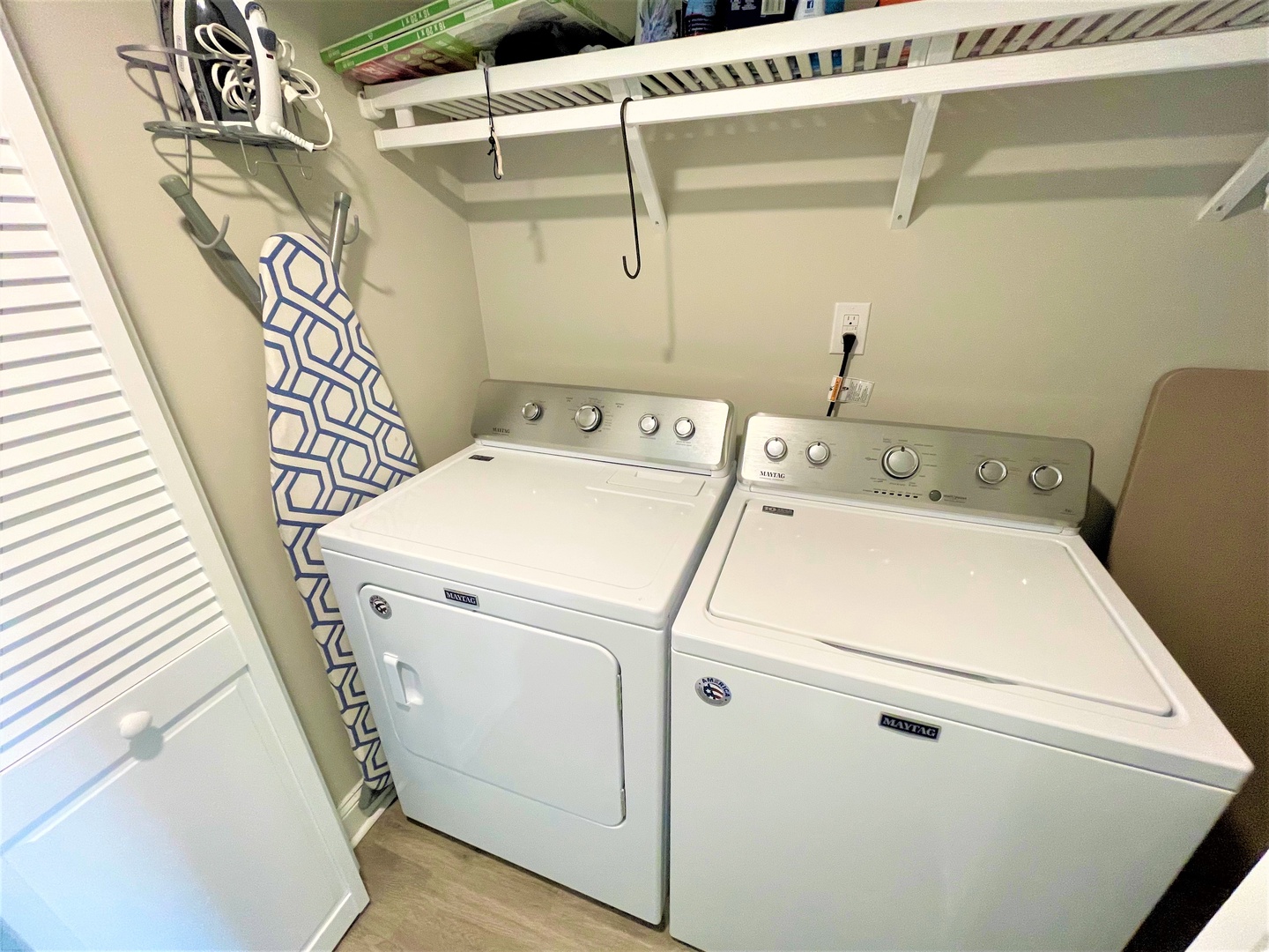 Your dedicated laundry space features full-sized washer and dryer with ample shelving for all your storage needs during your stay.