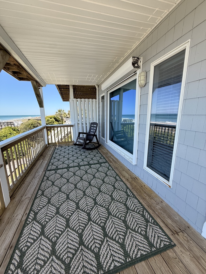 This private balcony offers your own peaceful retreat with comfortable seating and a city view, perfect for morning coffee or evening relaxation.