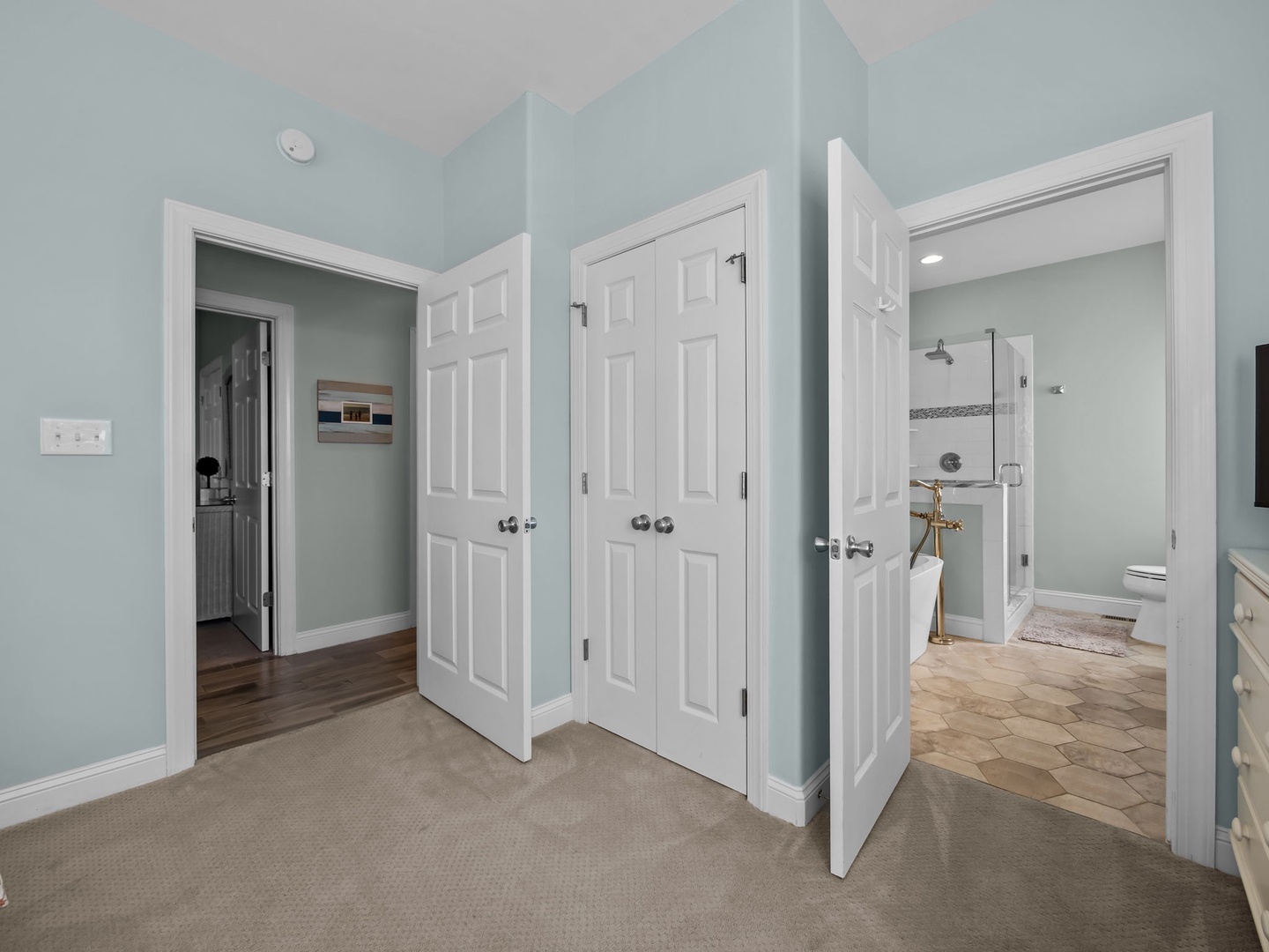 Discover your private suite with multiple closets for all your belongings and an ensuite bathroom featuring elegant marble tiles.