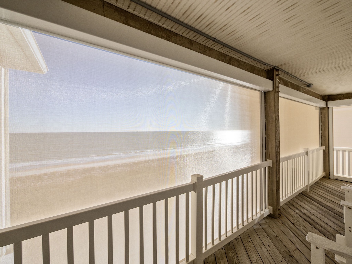 Step onto your private covered balcony and breathe in the ocean breeze while watching waves roll across pristine sands.