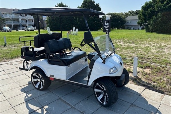 Your personal golf cart awaits to whisk you around the property with comfort and style.