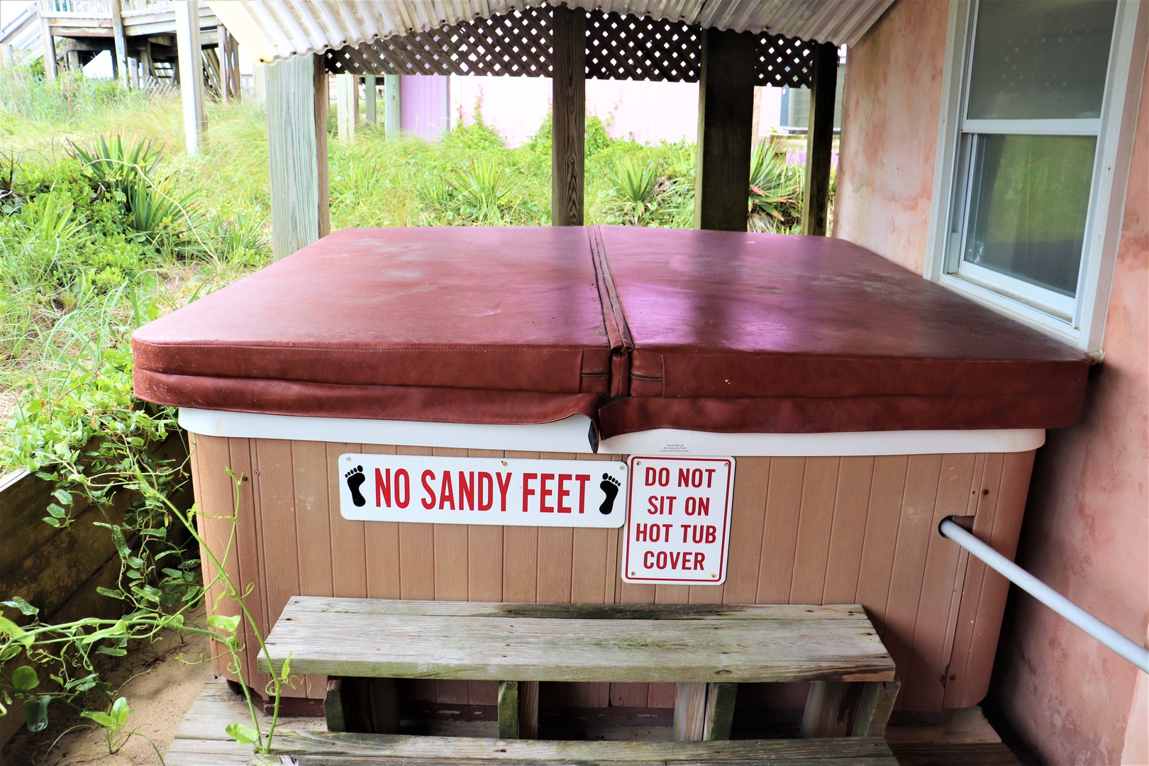 Soak away your stress in your private hot tub, perfectly positioned on the covered patio surrounded by lush tropical greenery.