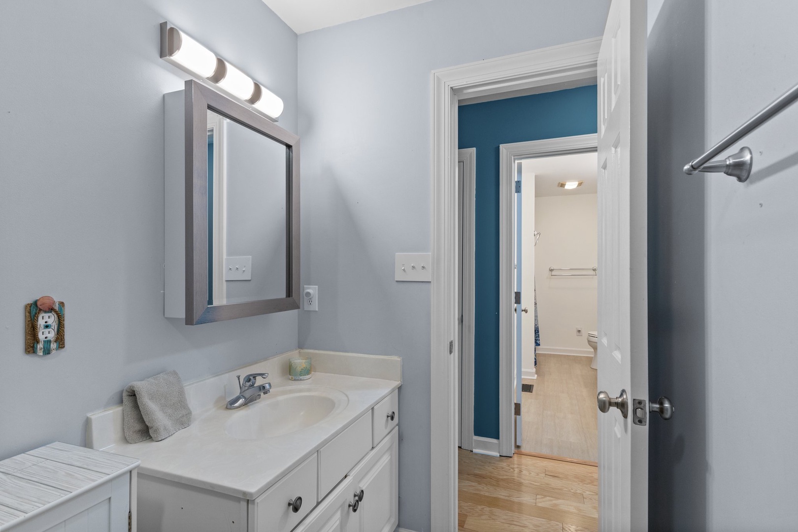 Your private bathroom features a spacious vanity with perfect lighting for your morning routine and evening wind-down.