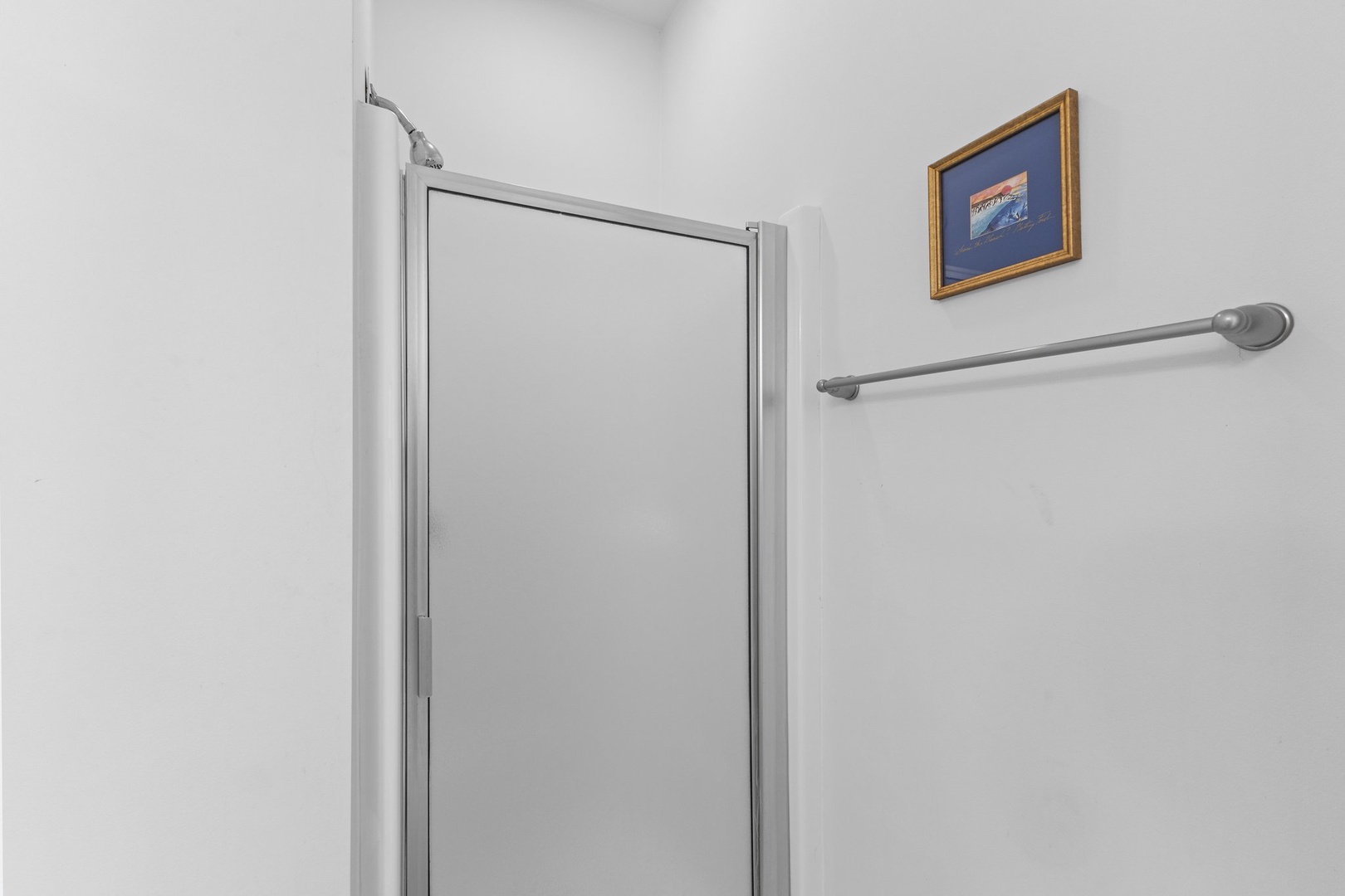 Your private bathroom features a spacious shower with grab bar for added safety and comfort during your stay.