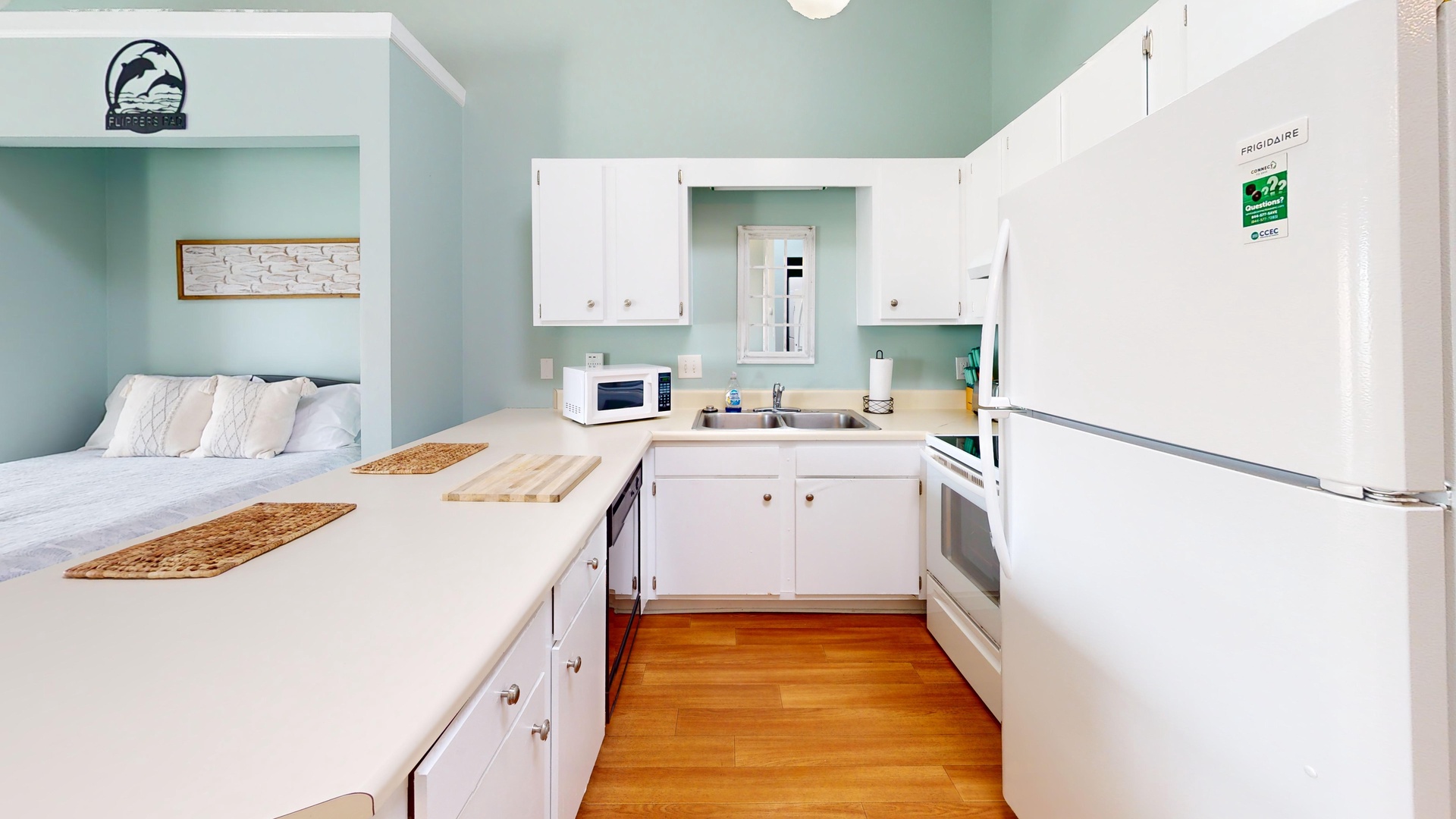 Your fully equipped kitchen features everything needed for home cooking, from the full-size refrigerator to microwave and ample counter space for meal prep.