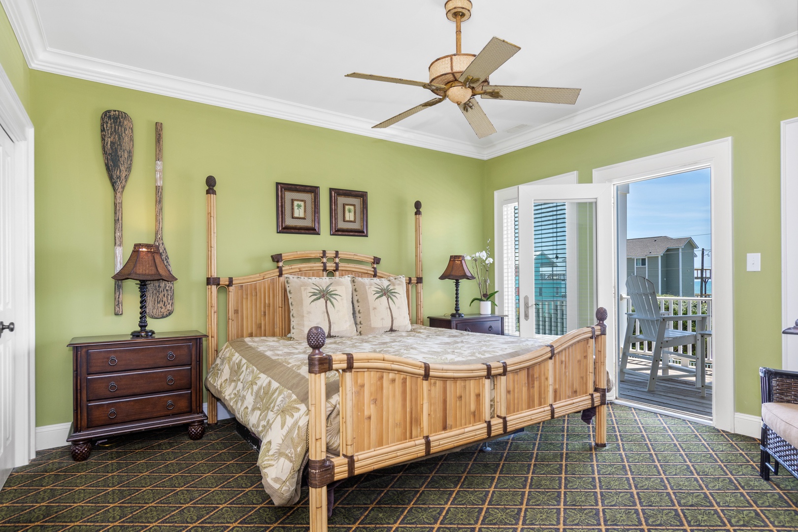 Drift off to tropical dreams in this coastal bedroom, where bamboo furnishings and palm-themed décor create your perfect island retreat.
