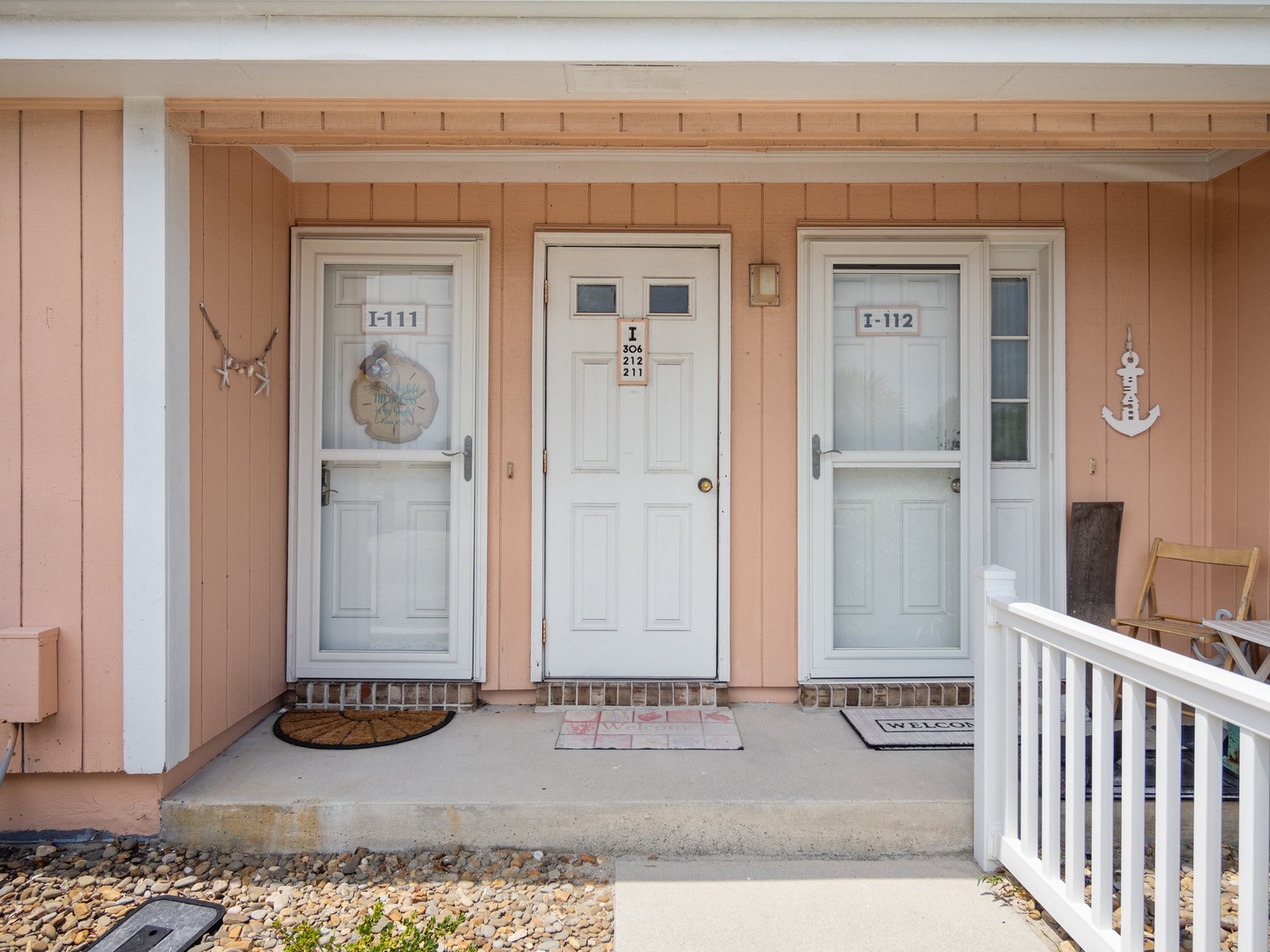 Welcome to your coastal retreat! These charming nautical-themed doors feature adorable maritime decor that sets the perfect seaside mood for your stay.