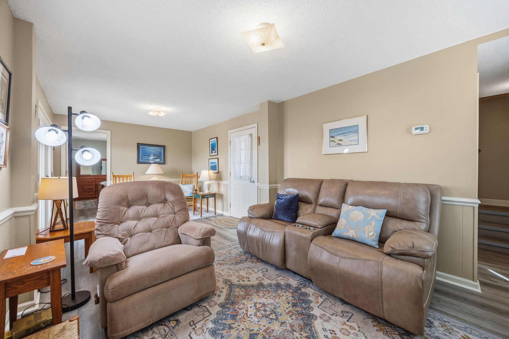 Sink into plush leather seating in your comfortable living room, perfect for movie nights and morning coffee moments together.