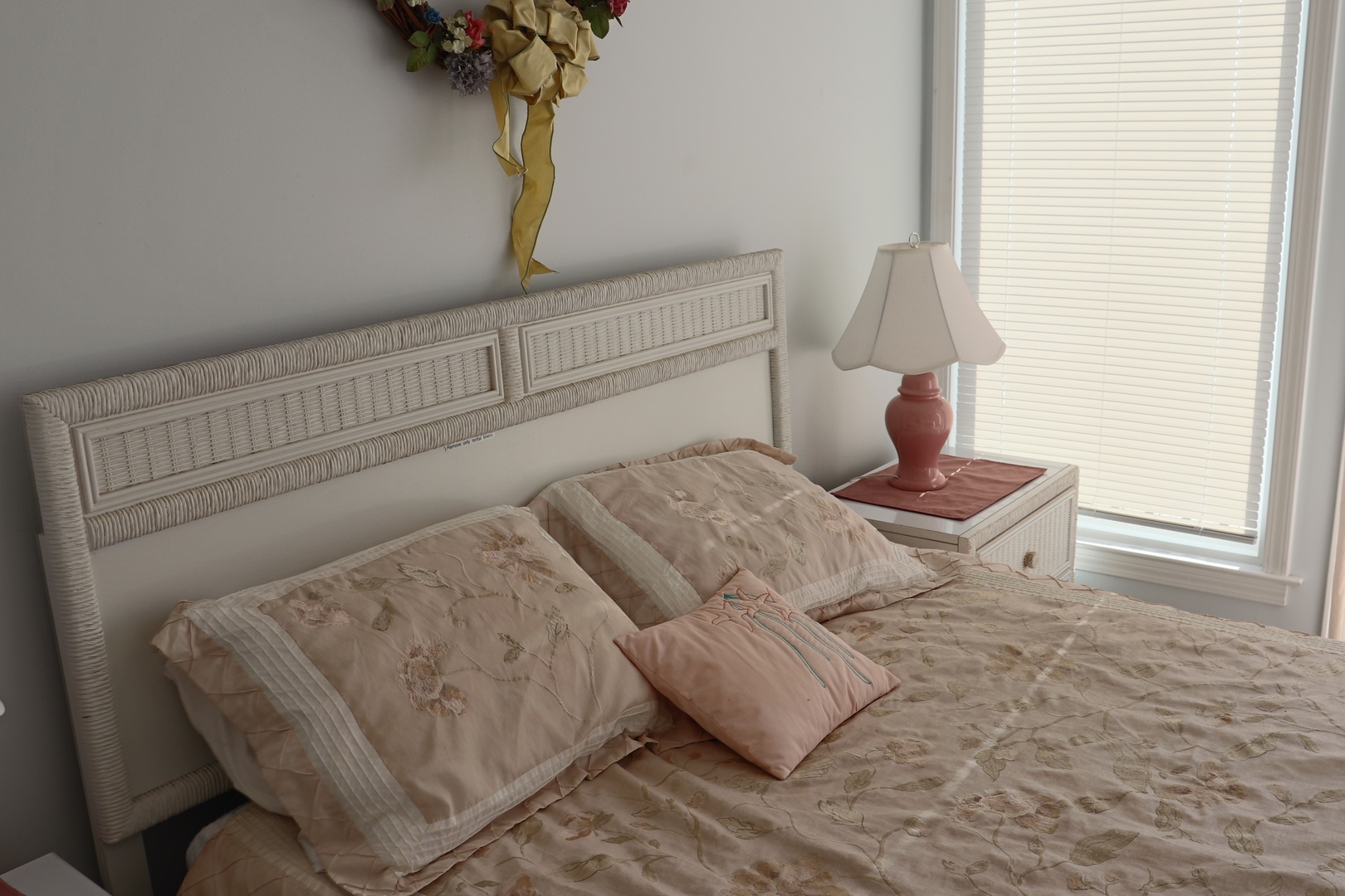 Settle into your serene bedroom retreat with soft linens and gentle natural light filtering through the blinds.