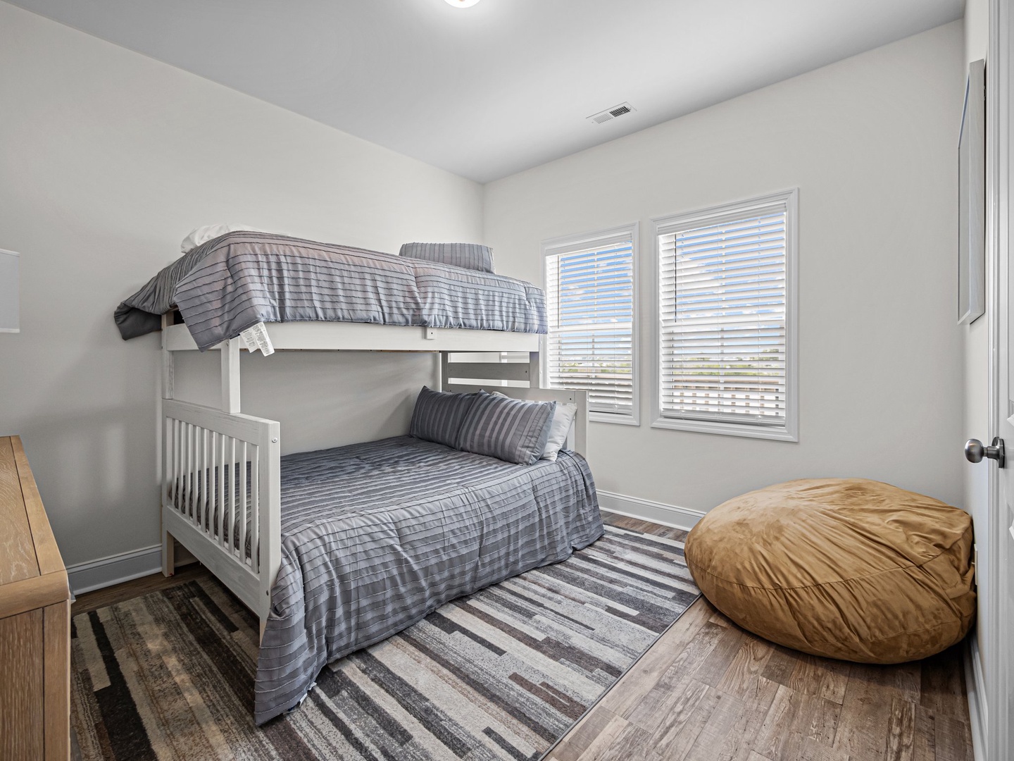 Cozy bunk room where kids can claim their favorite spot and create lasting vacation memories together.