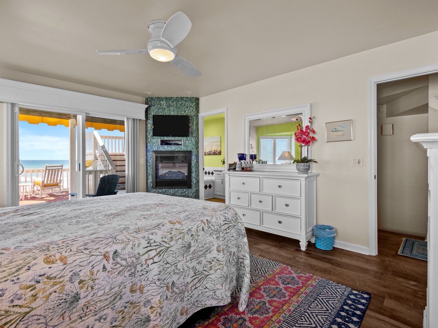 Your oceanfront bedroom features a cozy fireplace and opens to your private balcony with stunning sea views.