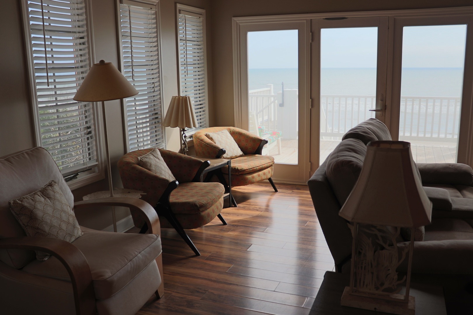 Sink into plush seating while watching waves through floor-to-ceiling windows. Your beachfront retreat offers stunning ocean views from every comfortable chair.
