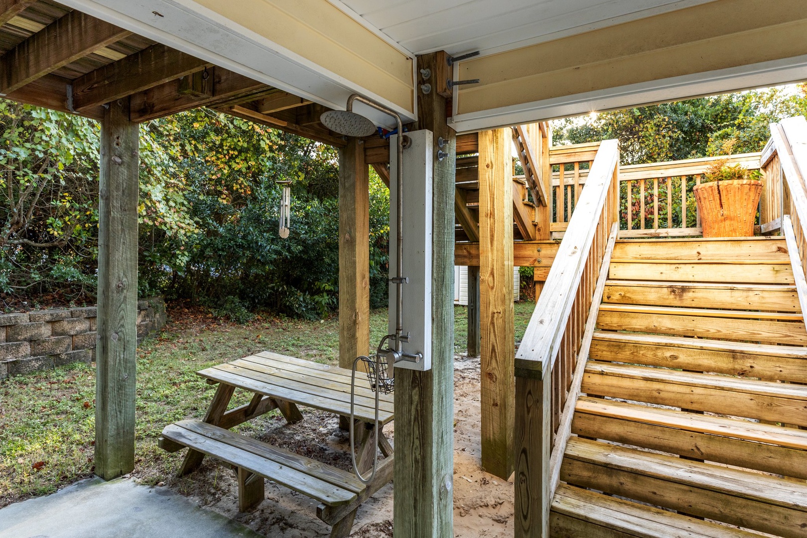 Rinse off after your outdoor adventures in this convenient covered shower area, complete with a picnic table for your gear.
