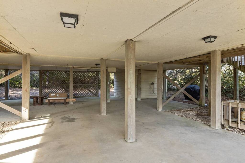 Covered parking area provides plenty of space for your vehicle and outdoor storage needs.