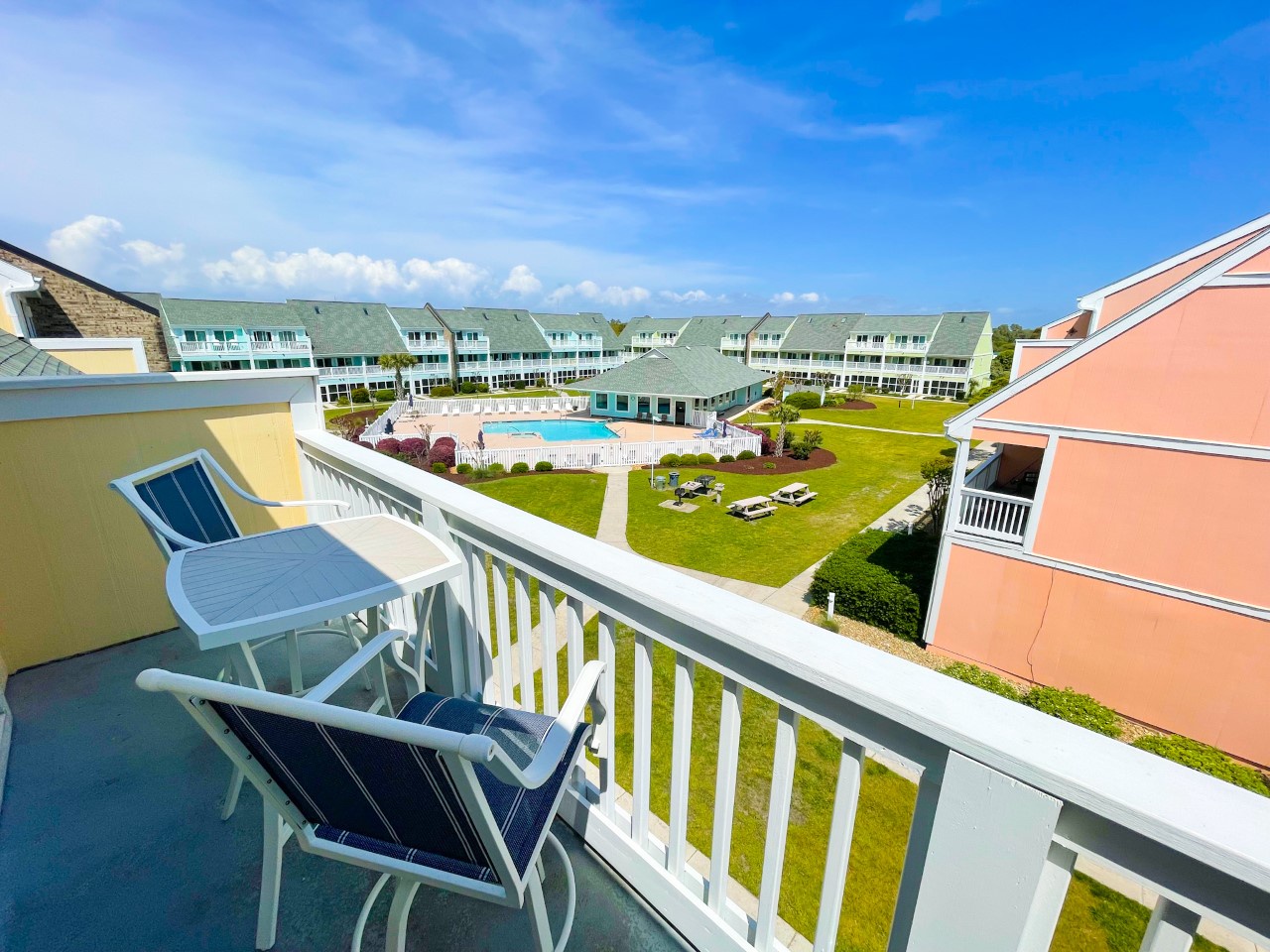 Step out onto your private balcony and soak in the resort views while sipping morning coffee in comfortable outdoor seating.