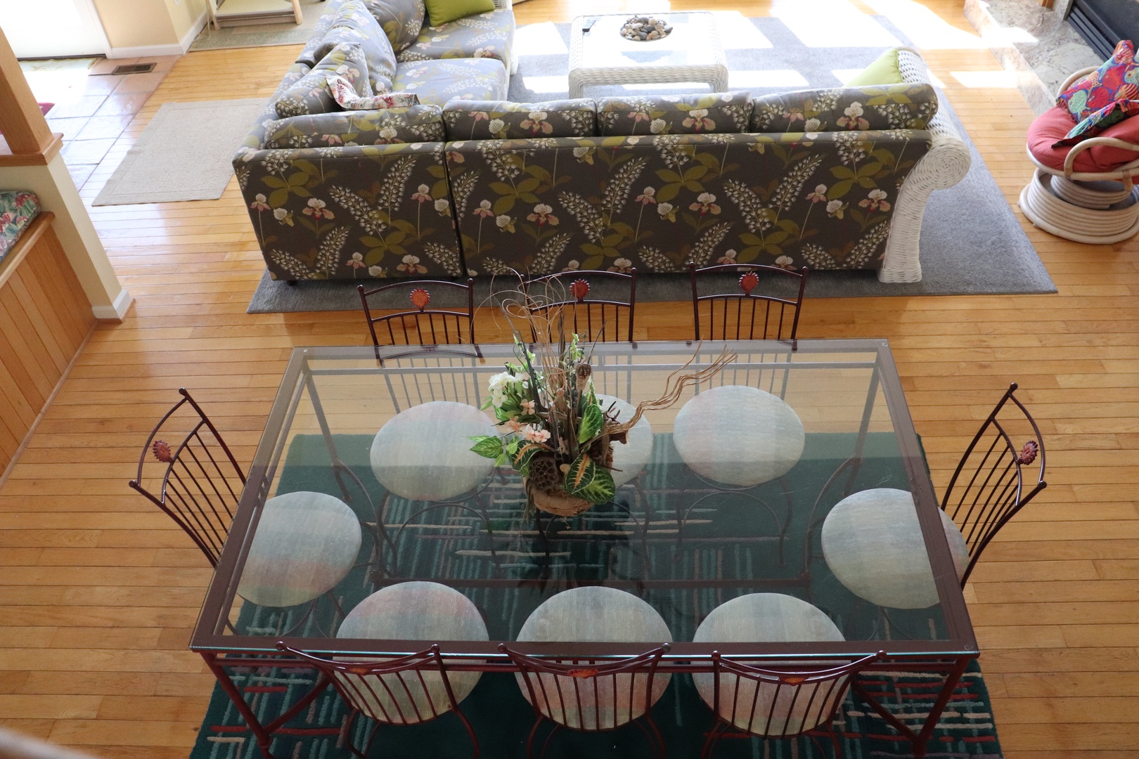 Gather around your elegant glass dining table for eight, where memorable meals and conversations await in this thoughtfully designed living space.