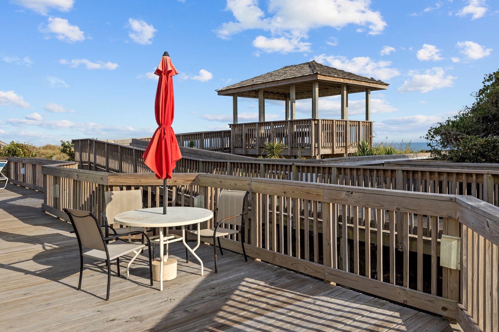 Unwind at your private deck with ocean breezes and stunning coastal views stretching to the horizon.