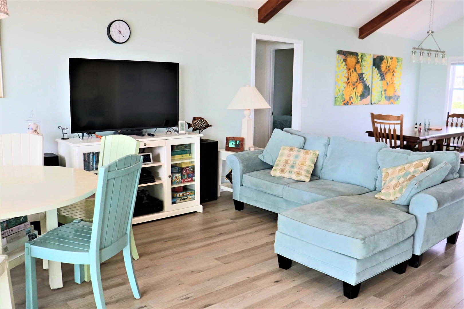 Relax in your bright, airy living space with plush seating and charming coastal touches that make you feel right at home.