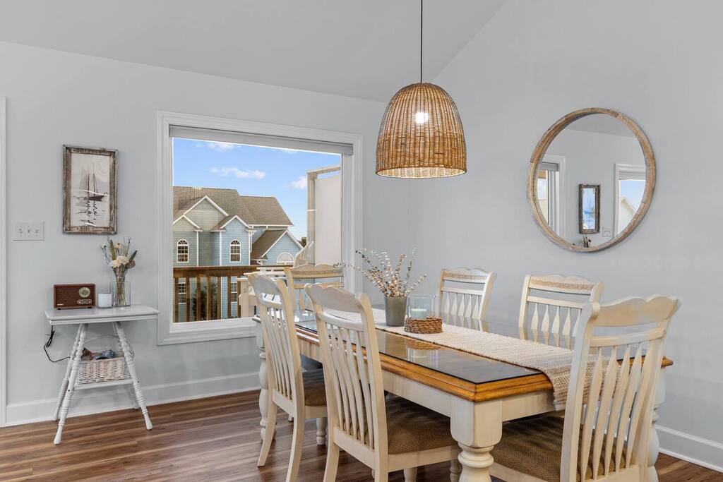 Gather around this charming dining table where coastal-inspired decor creates the perfect atmosphere for your morning coffee or family meals.