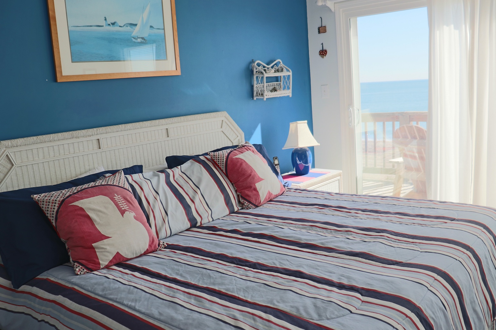 Drift into peaceful sleep in your nautical-themed bedroom, where ocean breezes and stunning sea views create the perfect coastal retreat.