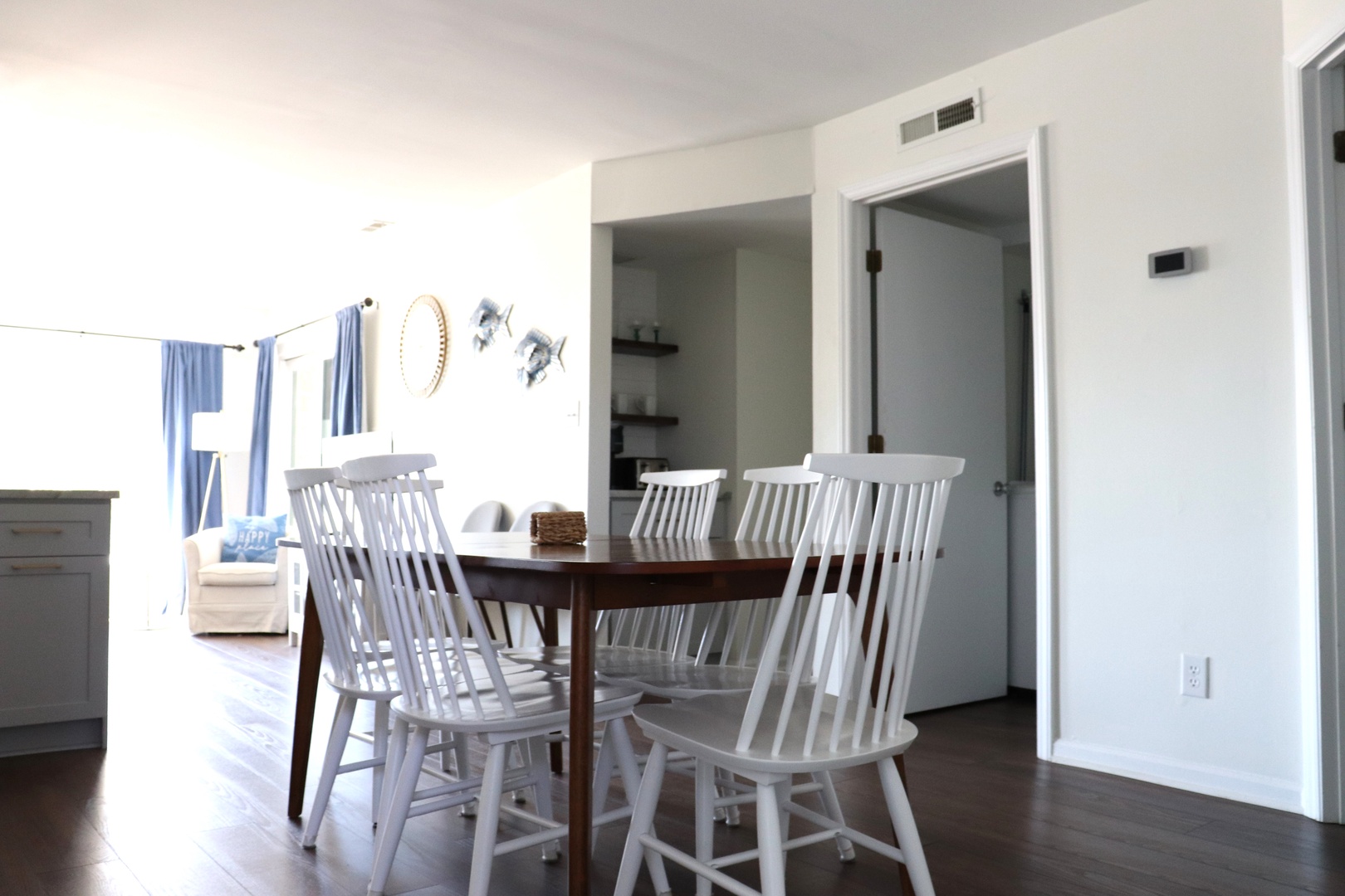 Your bright dining space flows seamlessly into the living area, perfect for memorable meals and conversations together.