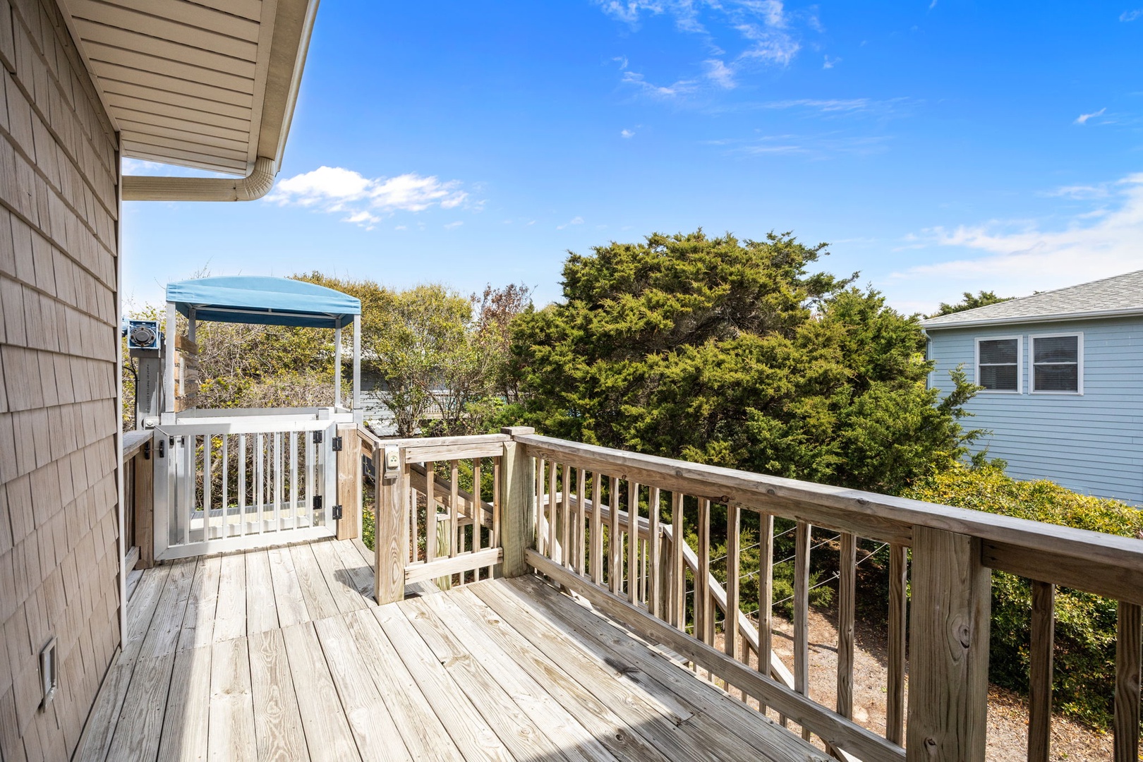 Step onto your private deck where sea breezes meet stunning blue skies, creating the perfect spot for morning coffee or sunset relaxation.
