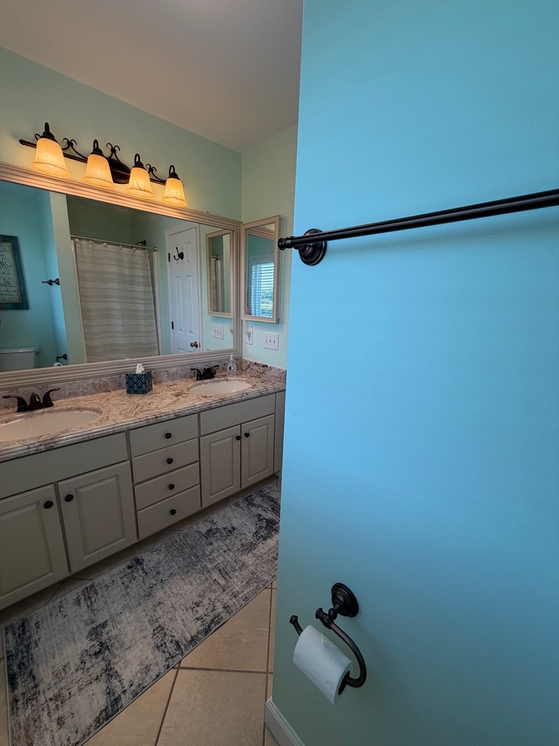 Unwind in your spacious bedroom with elegant furnishings, soft lighting, and thoughtful storage to keep your belongings organized during your stay.