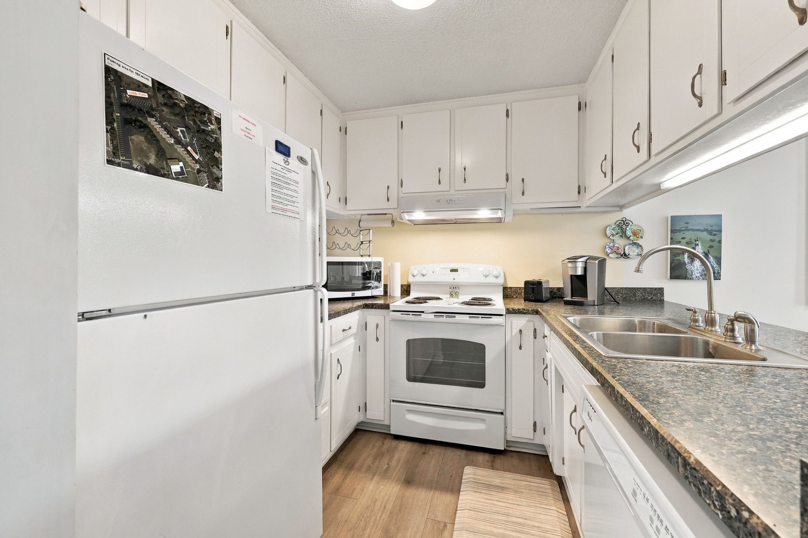 Step into your fully equipped kitchen, bright and ready for you to whip up morning coffee or prepare a leisurely homemade meal during your stay.