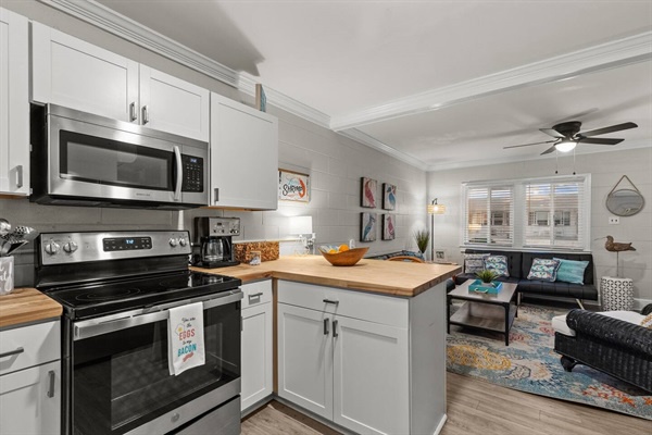 Your modern kitchen opens perfectly to the cozy living space, creating a warm hub where you'll love cooking and relaxing together.