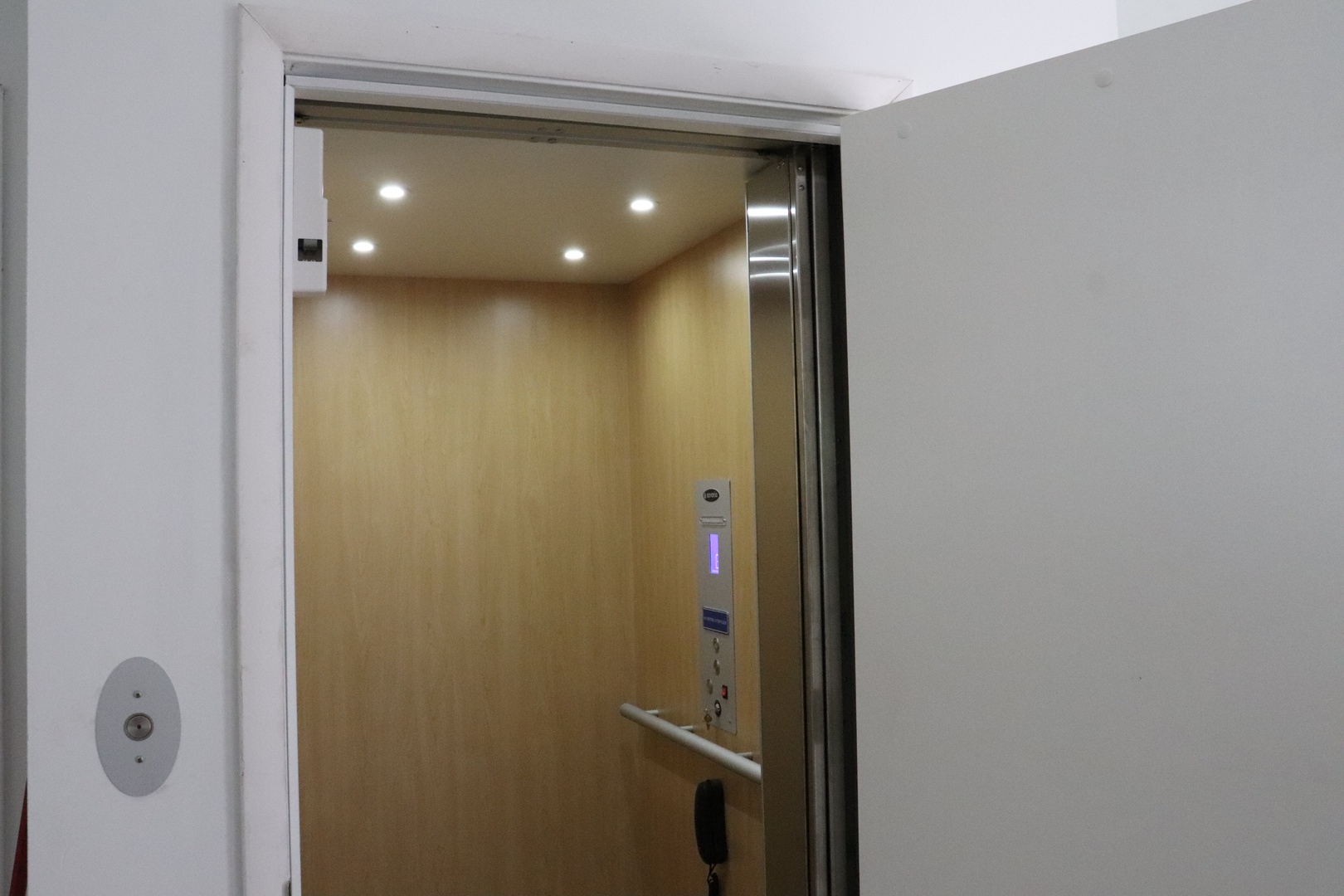 The elevator is ready to carry you and your belongings smoothly between floors, making arrival and departure effortless.