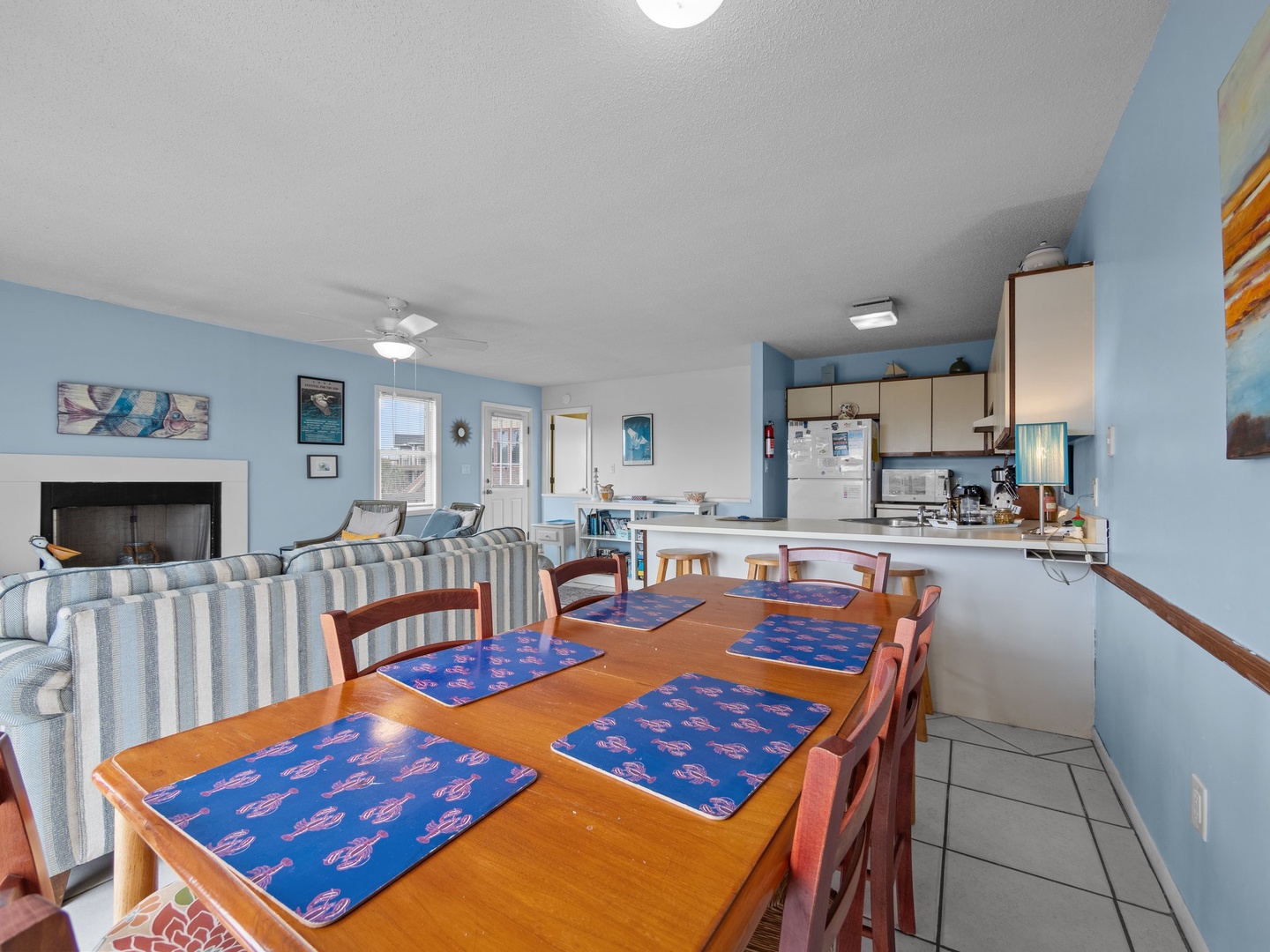 Gather around your spacious dining table for family meals, then relax in the comfortable living room with fireplace nearby.