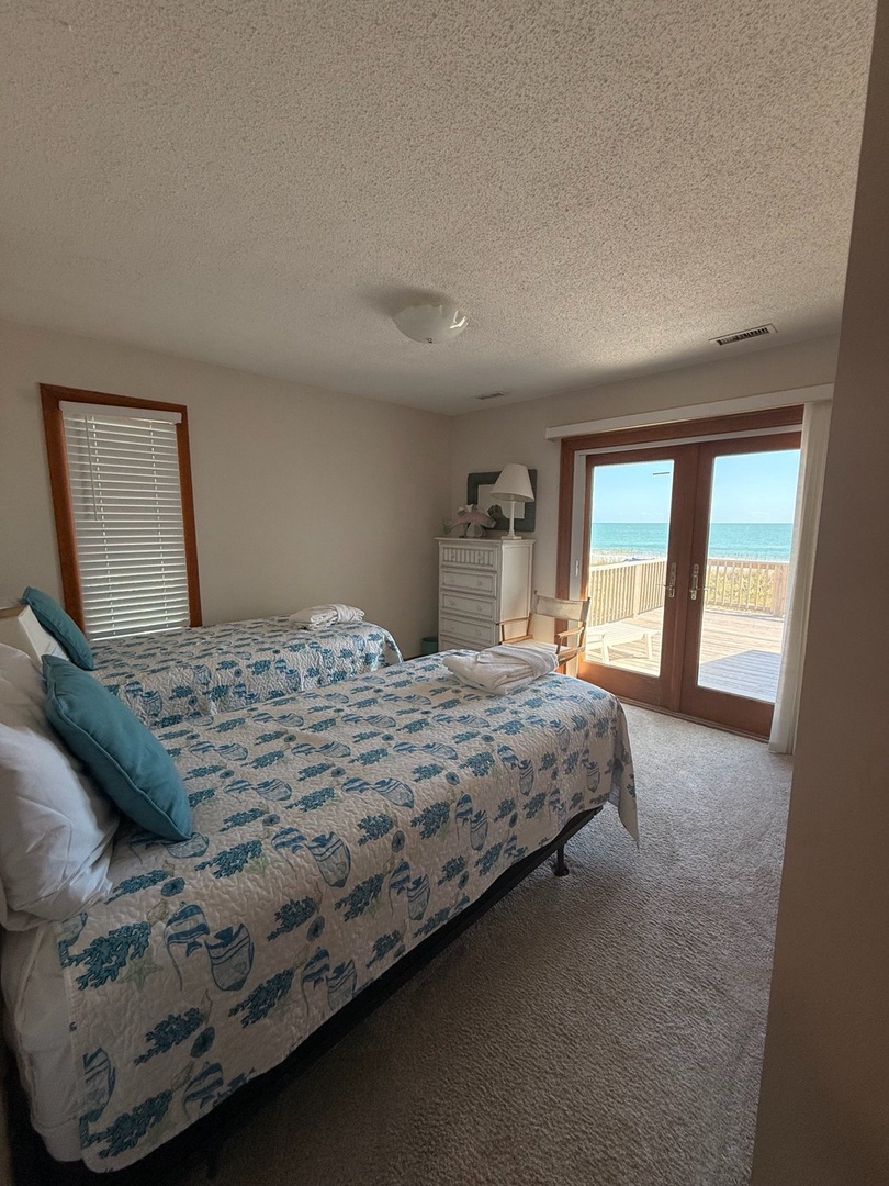 Wake up to the ocean just beyond your door. Your beachfront bedroom opens directly onto the deck, bringing the sound of waves into your morning routine.