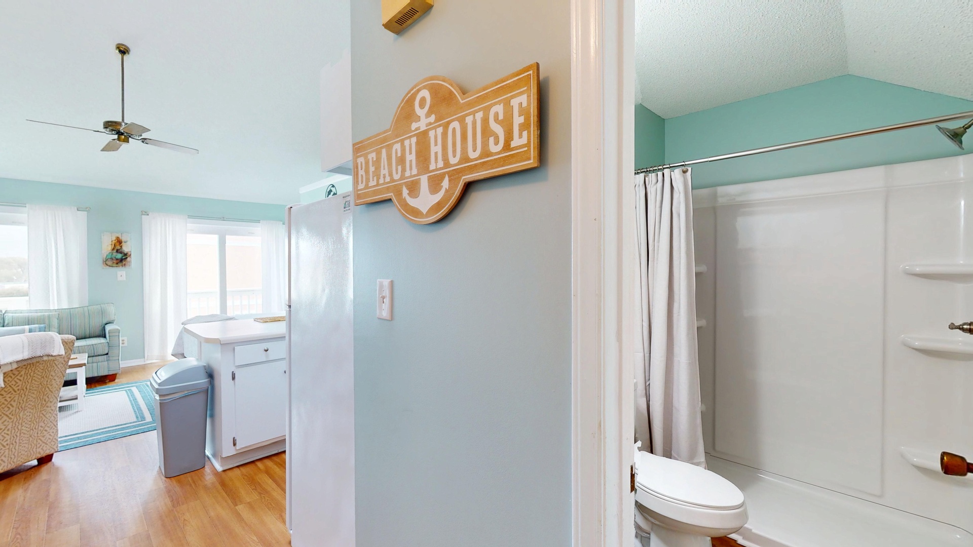 Coastal charm meets modern comfort in your beach house getaway. Step into soothing blues, fresh decor, and all the essentials for seaside relaxation.