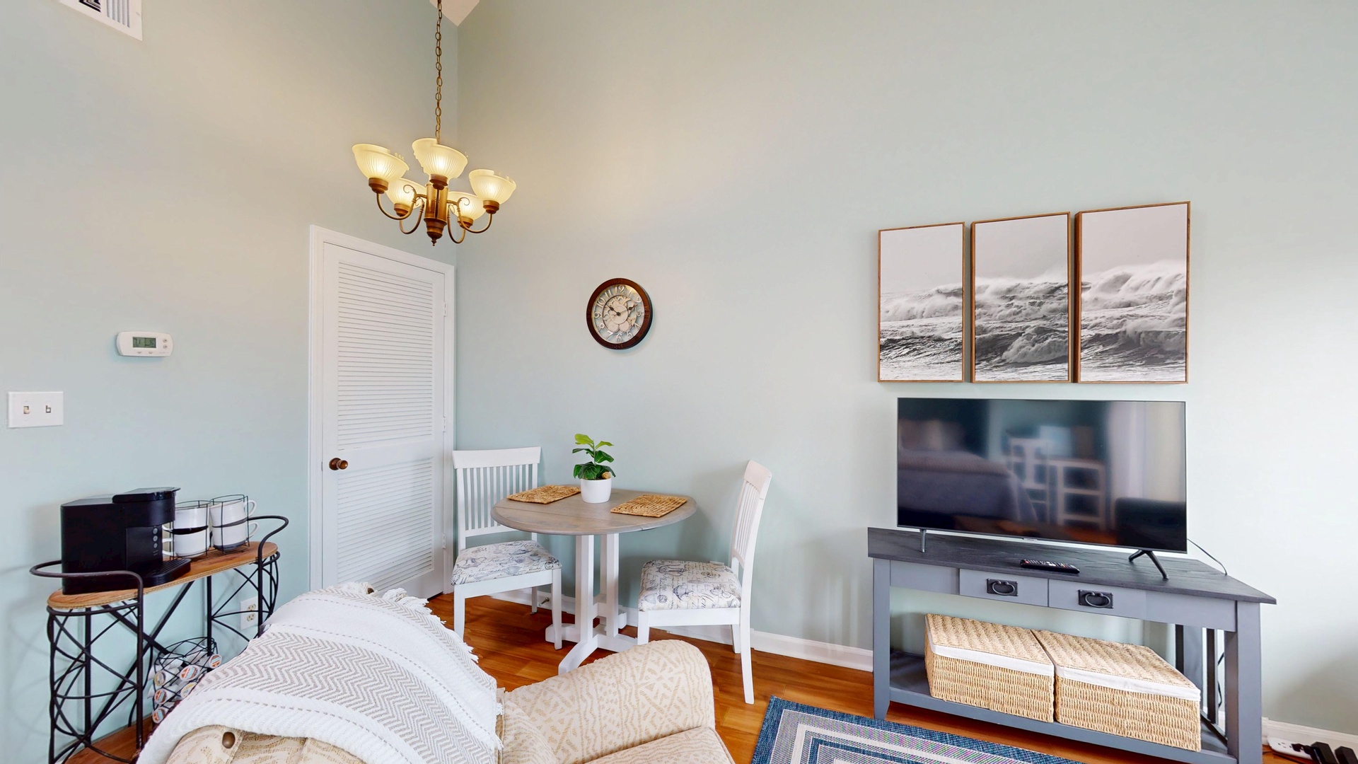 Unwind in your bright, airy living space with comfortable seating, dining nook, and entertainment center for perfect relaxation.