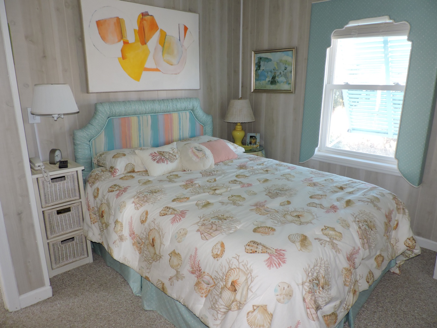 Drift off in your coastal-themed bedroom with sea shell bedding and soft morning light streaming through your window.