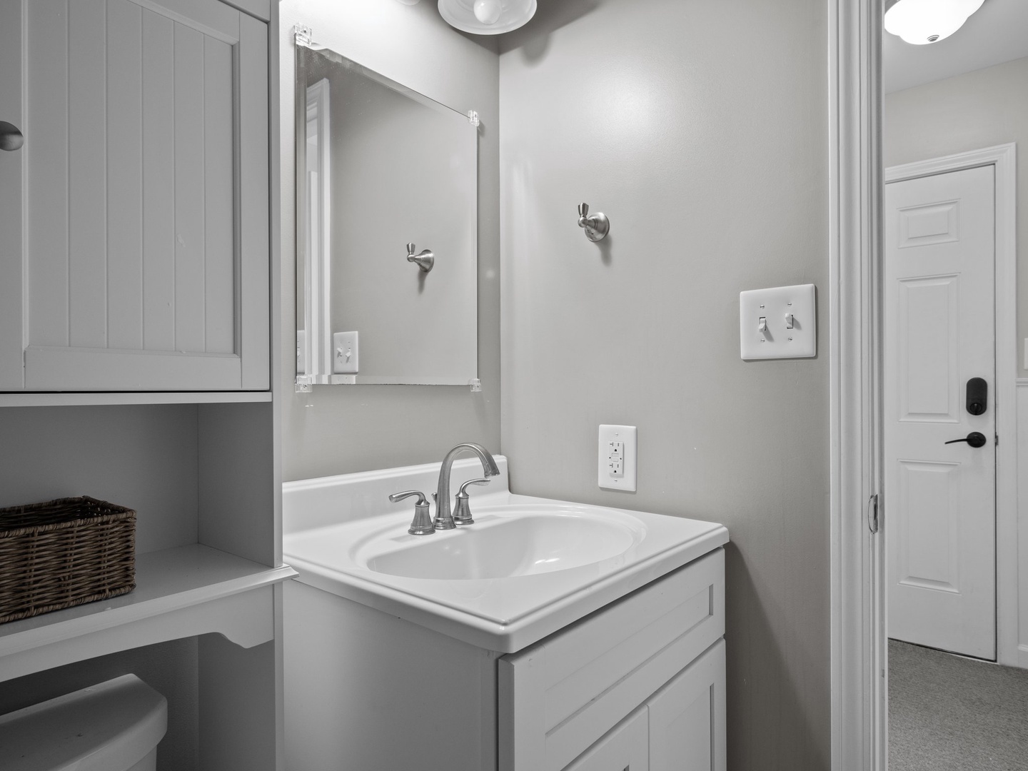 Refresh in this pristine bathroom with modern fixtures and thoughtful storage—your morning routine just got an upgrade.