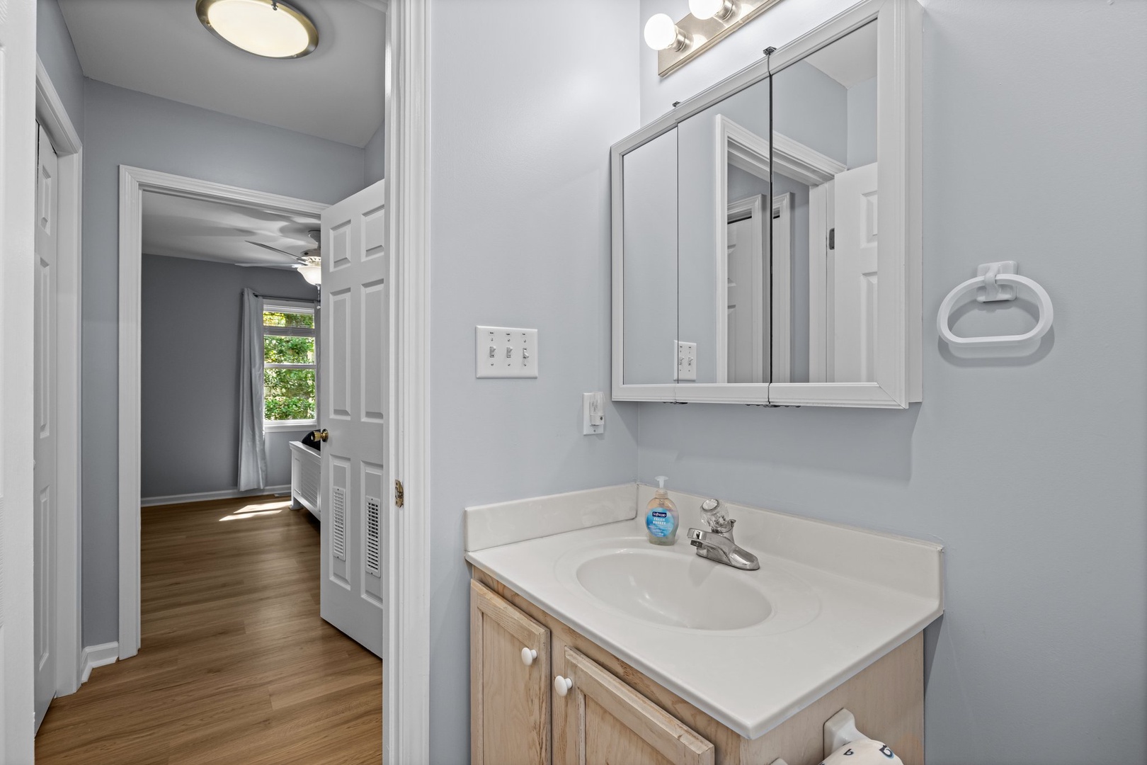 Your private bathroom features fresh linens, warm lighting, and everything you need for a refreshing start to your day.