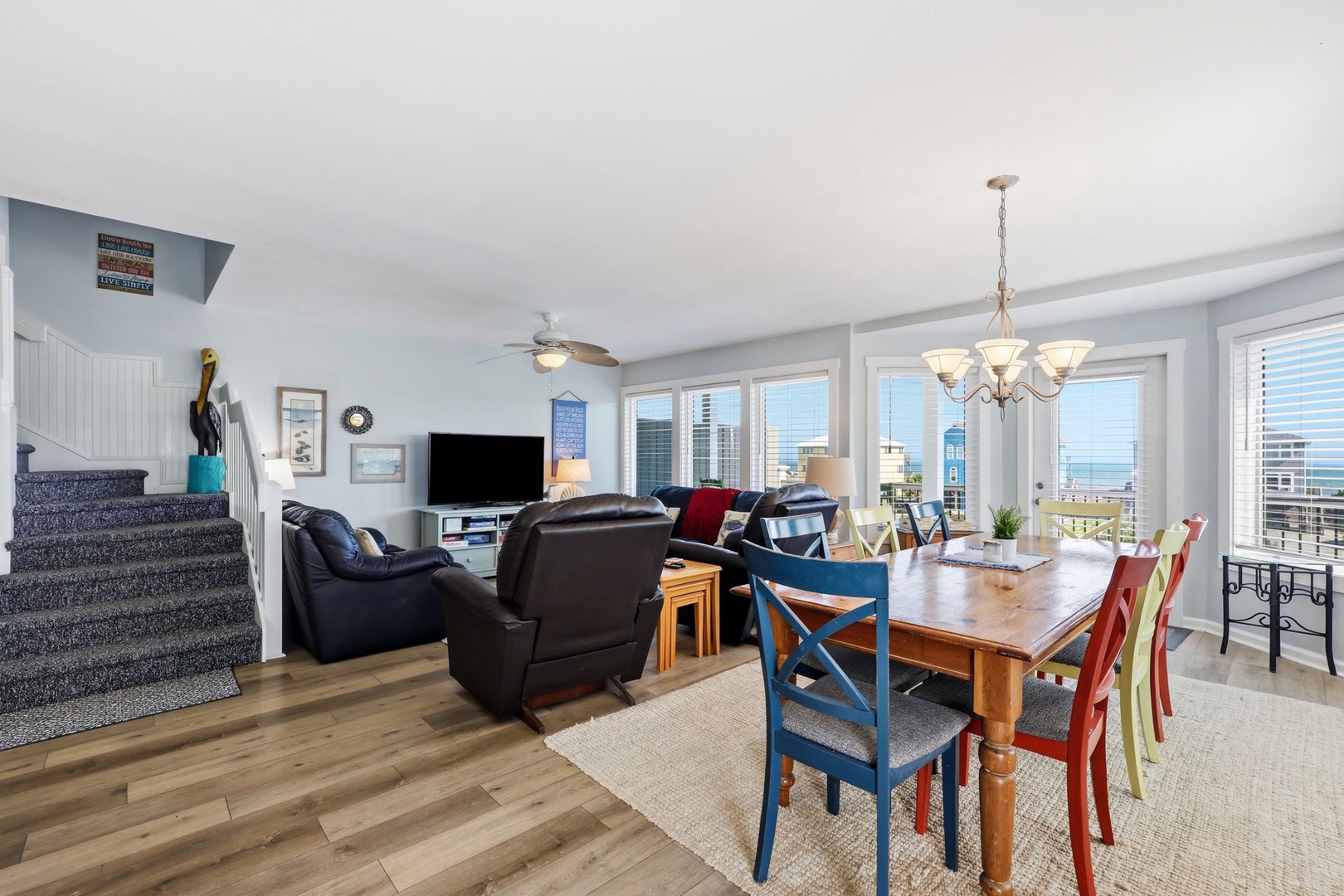 Open living area flowing seamlessly into your dining space, where ocean views and natural light create the perfect backdrop for meals and relaxation.