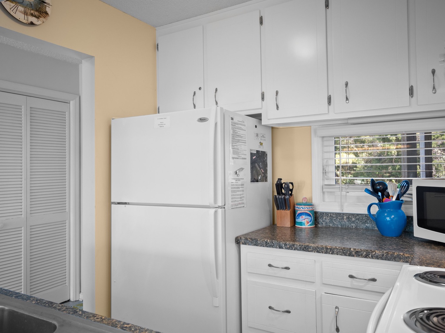 Your fully equipped kitchen features modern appliances and ample storage for preparing memorable meals during your stay.