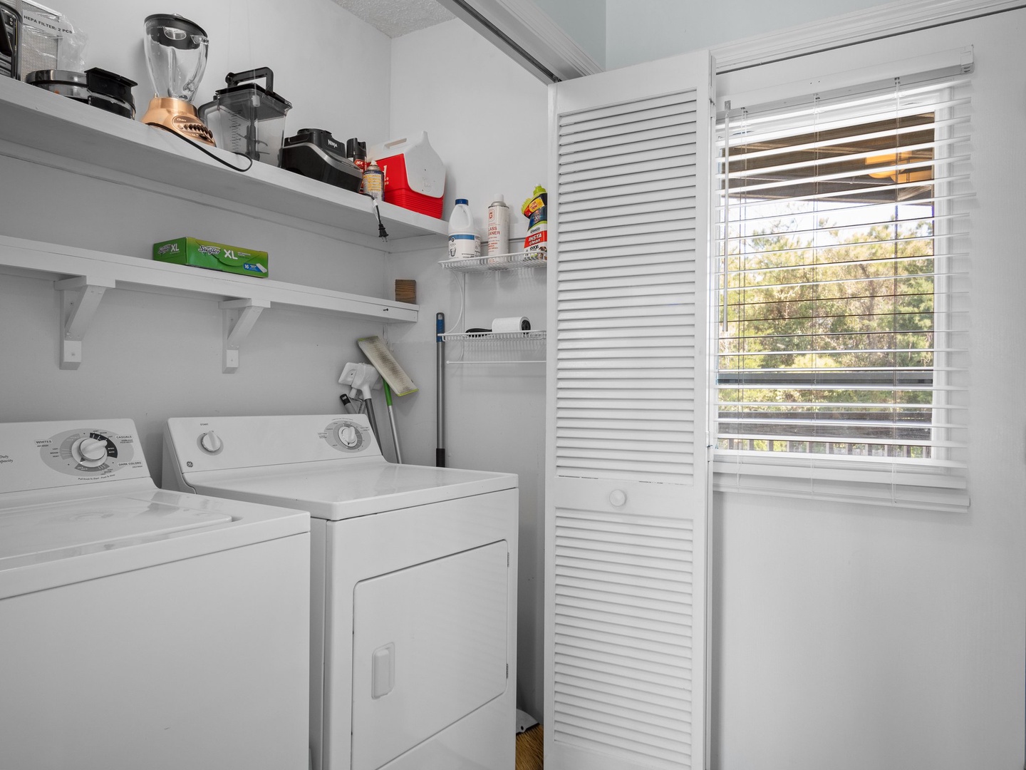 Your dedicated laundry room features full-size washer and dryer with convenient storage shelves, making longer stays effortless and comfortable.
