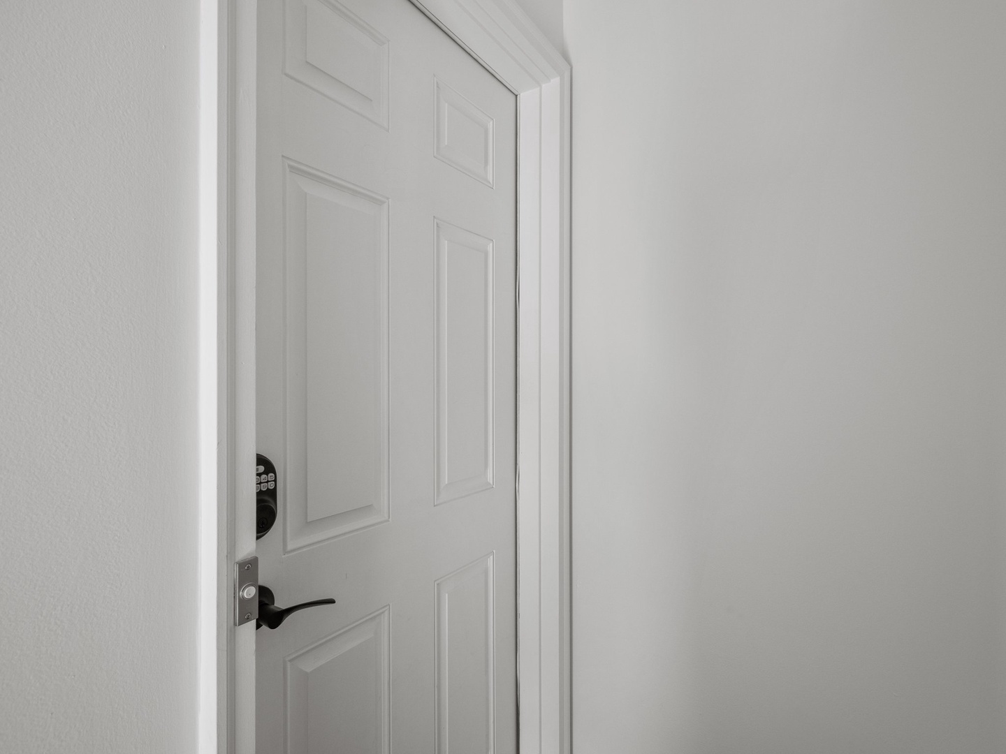 Step inside your private sanctuary with secure keypad entry for seamless check-in.