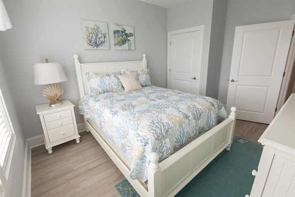Drift into coastal dreams in your serene bedroom featuring ocean-inspired bedding and charming seaside artwork.