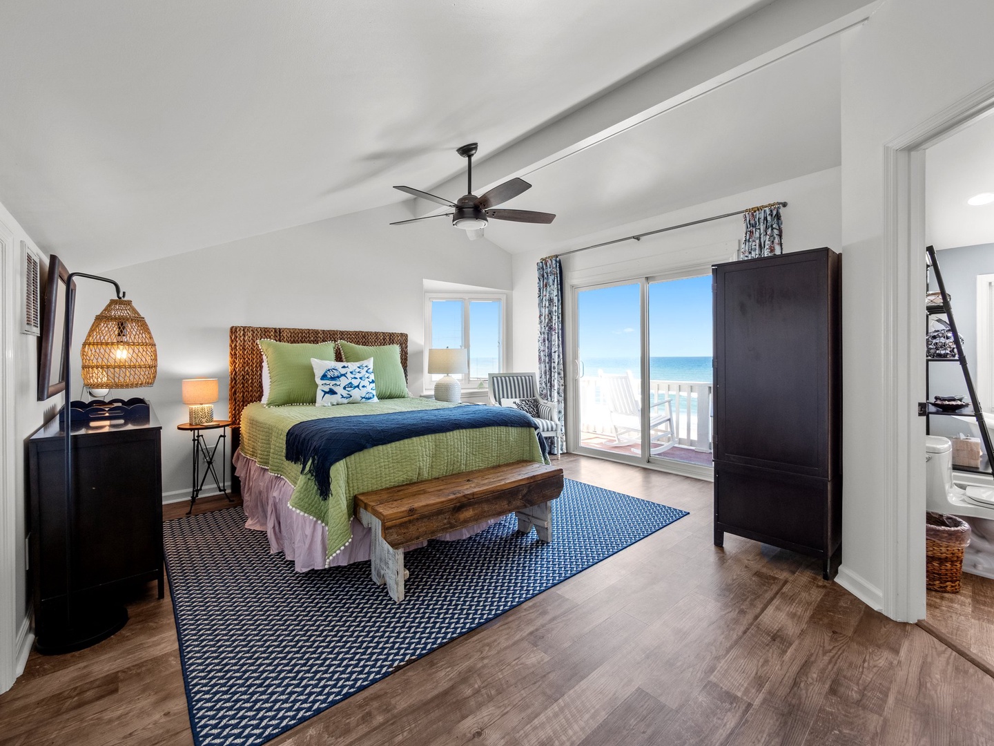 Wake up to stunning ocean views from your coastal bedroom, where natural textures and soothing colors create your perfect seaside retreat.