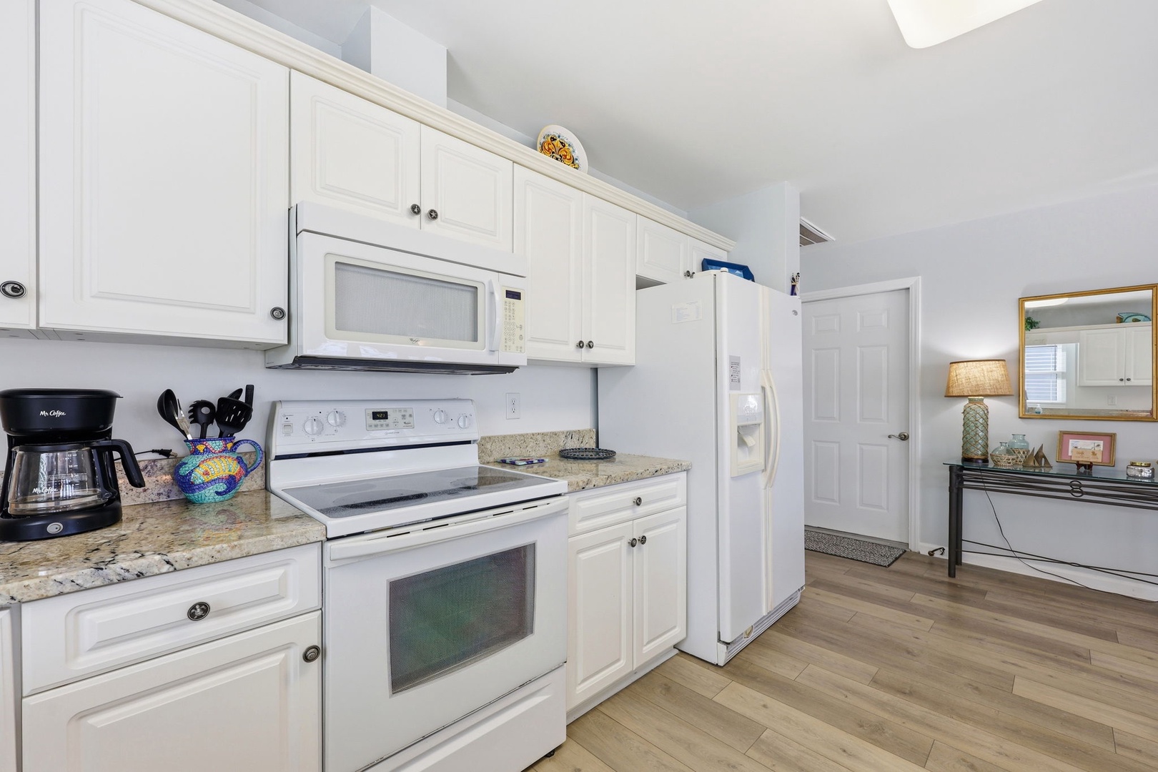 Your fully equipped kitchen features modern appliances, granite counters, and everything you need to prepare meals in comfort during your stay.