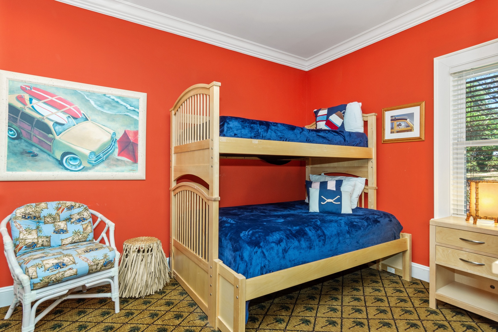 Dive into adventure in your vibrant bedroom with cozy bunk beds and playful nautical decor that sparks imagination.
